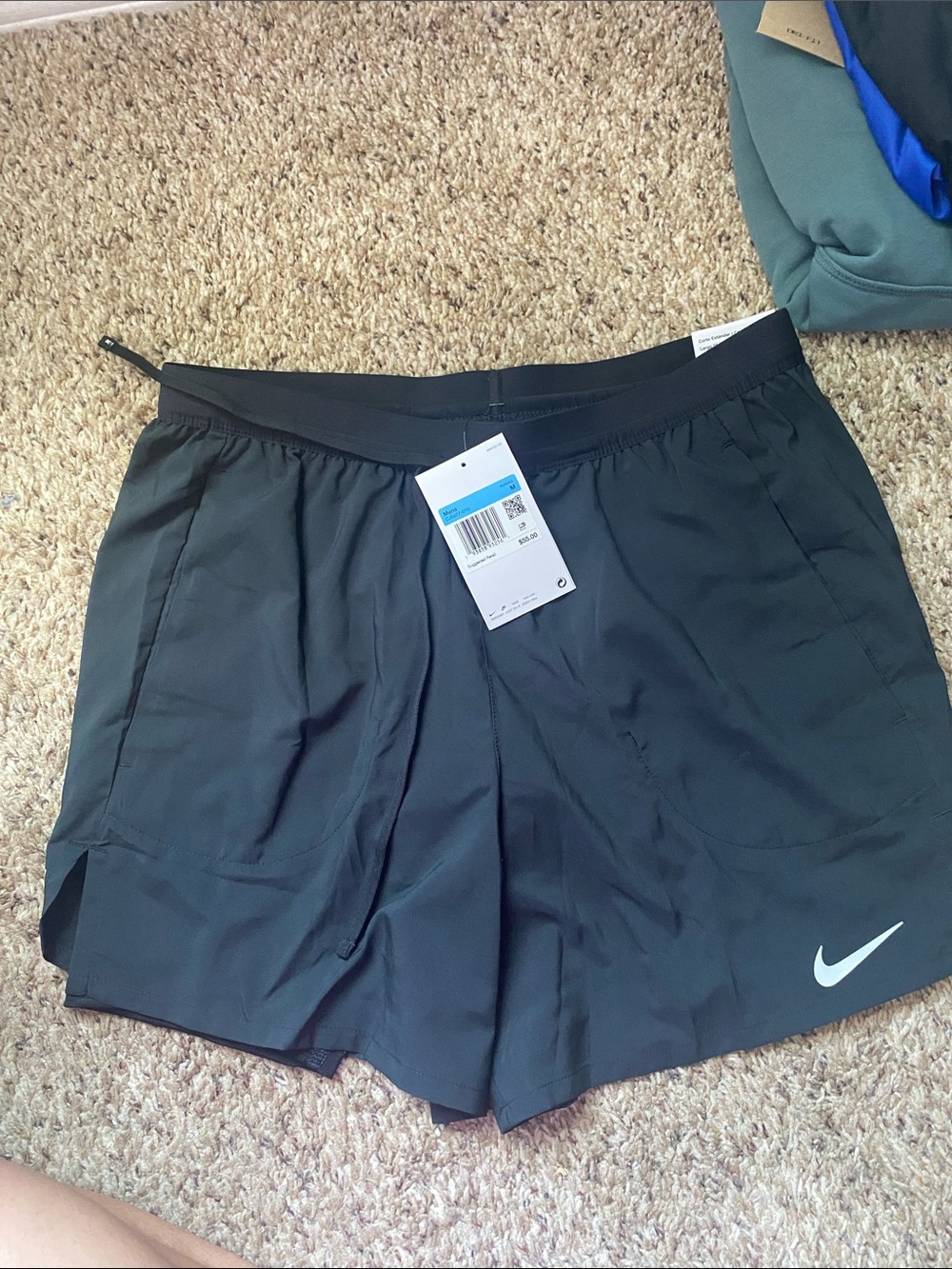 Nike Men's Black Athletic Shorts with White Swoosh